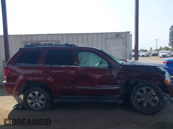 2008 Jeep Grand Cherokee Limited z VIN 1J8HR58268C220533, wystawiony jako IAAI lot #43116150 z przebiegiem 122 623 mil mil oraz . Historia ofert i sprzedaży dostępna na DreamBid. Obrazek 13.