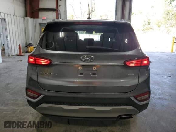 2019 Hyundai Santa Fe SE with VIN 5NMS2CAD7KH095410, listed as a Copart auction lot 86133115 with 98,866 mi miles and Salvage title. Bid and sale history available at DreamBid. Image 6.