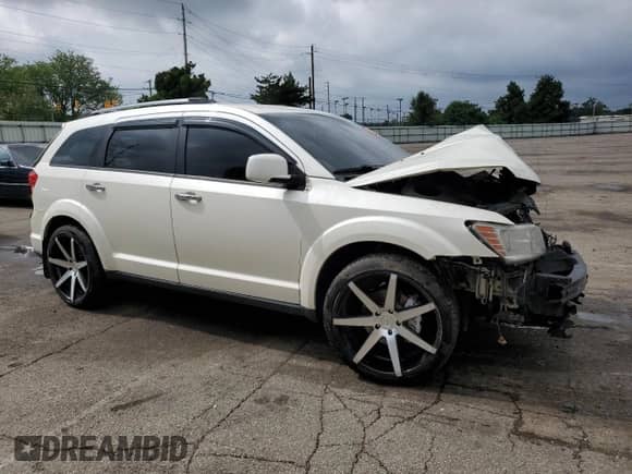 2014 Dodge Journey Limited с VIN 3C4PDCDG9ET151182, выставлен на аукционе Copart как лот 60344245 с пробегом Не указан миль и Списание • Salvage title. История ставок и продаж доступна на DreamBid. Изображение 4.