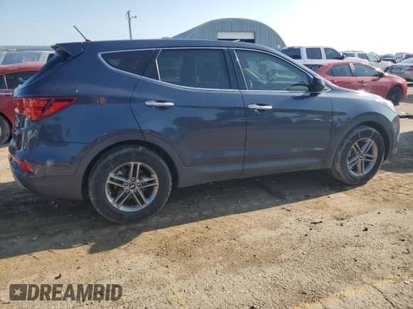2018 Hyundai Santa Fe 2.4L с VIN 5NMZTDLB9JH095100, выставлен на аукционе Copart как лот 64850795 с пробегом 92 794 миль миль и Списание • Salvage title. История ставок и продаж доступна на DreamBid. Изображение 3.