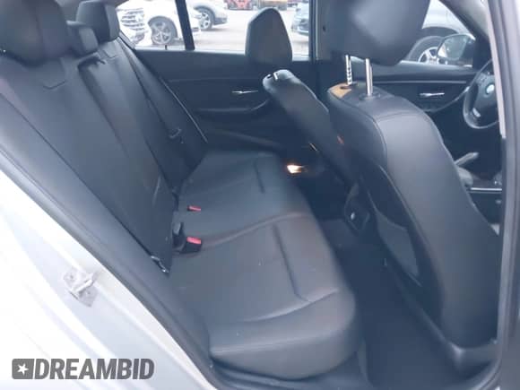 2018 BMW 3 Series 320i with VIN WBA8A9C51JAH12024, listed as a IAAI auction lot 43198146 with 98,143 mi miles and . Bid and sale history available at DreamBid. Image 8.