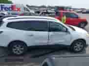 2016 Chevrolet Traverse LT z VIN 1GNKRHKD1GJ282156, wystawiony jako IAAI lot #43041386 z przebiegiem 122 607 mil mil oraz . Historia ofert i sprzedaży dostępna na DreamBid. Obrazek 13.
