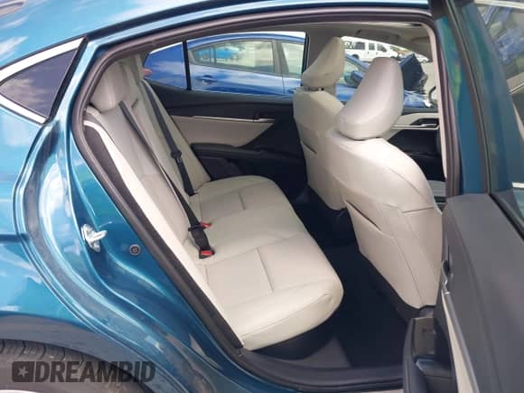 2025 Toyota Camry LE with VIN 4T1DAACK9SU566859, listed as a IAAI auction lot 42098136 with 1,562 mi miles and . Bid and sale history available at DreamBid. Image 8.