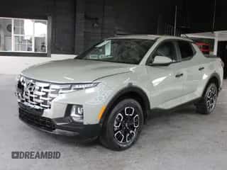 2022 Hyundai Santa Cruz SEL с VIN 5NTJBDAEXNH026424, выставлен на аукционе Copart как лот 84966165 с пробегом 50 074 миль миль и На запчасти • Non repairable. История ставок и продаж доступна на DreamBid. Изображение 2.
