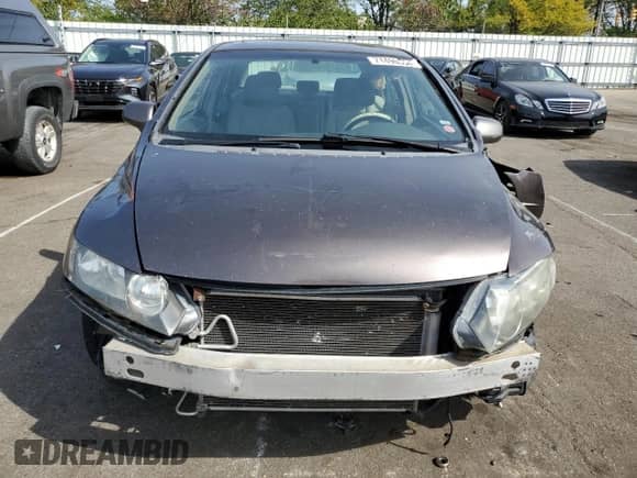 2010 Honda Civic with VIN 19FXA1F8XAE019092, listed as a Copart auction lot 71496354 with 185,077 mi miles and Salvage title. Bid and sale history available at DreamBid. Image 5.