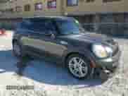2011 MINI Hardtop S with VIN WMWSV3C58BTY11594, listed as a Copart auction lot 82583025 with 98,138 mi miles and Salvage title. Bid and sale history available at DreamBid. Image 4.