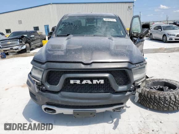 2020 Ram 1500 Rebel z VIN 1C6SRFLT2LN199221, wystawiony jako Copart lot #68965755 z przebiegiem 49 714 mil mil oraz Szkoda całkowita • Salvage title. Historia ofert i sprzedaży dostępna na DreamBid. Obrazek 5.