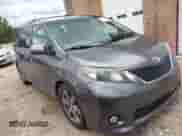 2012 Toyota Sienna SE with VIN 5TDXK3DC2CS235211, listed as a IAAI auction lot 42390354 with 242,602 mi miles and . Bid and sale history available at DreamBid. Image 1.