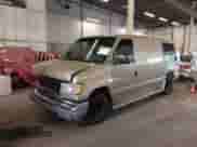 1999 Ford Econoline Cargo with VIN 1FDRE14W5XHA87026, listed as a IAAI auction lot 42573756 with 93,360 mi miles and . Bid and sale history available at DreamBid. Image 2.
