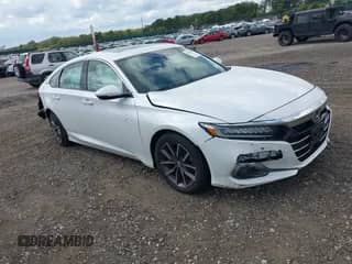 2021 Honda Accord EX-L with VIN 1HGCV1F52MA117975, listed as a IAAI auction lot 43123963 with 47,990 mi miles and . Bid and sale history available at DreamBid. Image 1.