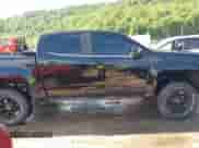 2018 Chevrolet Colorado 4WD LT z VIN 1GCGTCEN8J1198141, wystawiony jako IAAI lot #42497019 z przebiegiem 66 761 mil mil oraz . Historia ofert i sprzedaży dostępna na DreamBid. Obrazek 13.