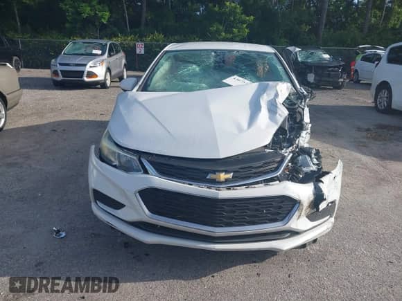 2017 Chevrolet Cruze LS z VIN 1G1BC5SM7H7226089, wystawiony jako IAAI lot #43075758 z przebiegiem 112 401 mil mil oraz . Historia ofert i sprzedaży dostępna na DreamBid. Obrazek 12.