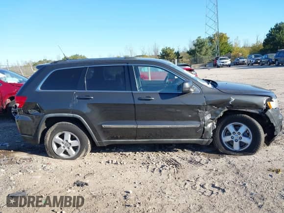 2011 Jeep Grand Cherokee Laredo z VIN 1J4RR4GG7BC530081, wystawiony jako IAAI lot #43404273 z przebiegiem 159 811 mil mil oraz . Historia ofert i sprzedaży dostępna na DreamBid. Obrazek 12.