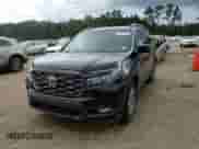 2025 Honda Passport TrailSport with VIN 5FNYF8H60SB018141, listed as a Copart auction lot 64741805 with 8,398 mi miles and Salvage title. Bid and sale history available at DreamBid. Image 14.