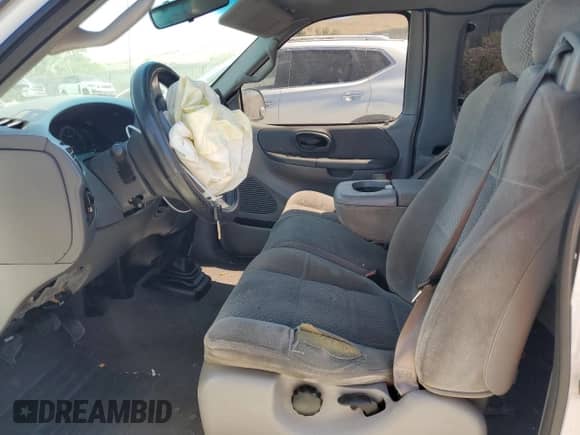 2001 Ford F-150 XL z VIN 1FTZX17251NB12930, wystawiony jako Copart lot #62517295 z przebiegiem Nie podano mil oraz Szkoda całkowita • Salvage title. Historia ofert i sprzedaży dostępna na DreamBid. Obrazek 7.