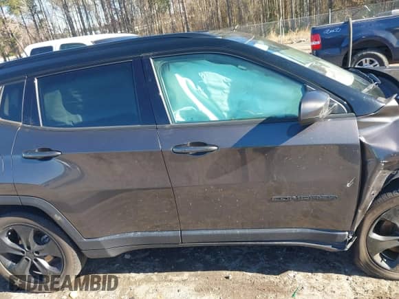 2020 Jeep Compass Latitude with VIN 3C4NJCBB8LT141103, listed as a IAAI auction lot 41263757 with 128,272 mi miles and . Bid and sale history available at DreamBid. Image 14.