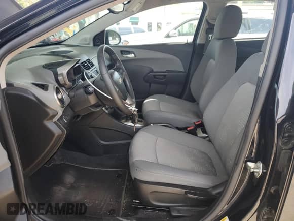 2014 Chevrolet Sonic LS с VIN 1G1JA5SHXE4145525, выставлен на аукционе Copart как лот 70354475 с пробегом 51 705 миль миль и Списание • Salvage title. История ставок и продаж доступна на DreamBid. Изображение 7.