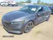 2018 Honda Accord Sport with VIN 1HGCV2F33JA052750, listed as a IAAI auction lot 43132811 with 57,286 mi miles and . Bid and sale history available at DreamBid. Image 2.