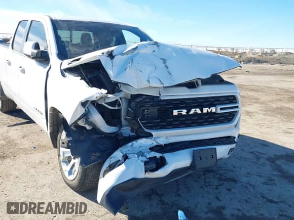 2022 Ram 1500 Big Horn z VIN 1C6RREBT7NN452563, wystawiony jako IAAI lot #41297916 z przebiegiem 27 231 mil mil oraz . Historia ofert i sprzedaży dostępna na DreamBid. Obrazek 6.