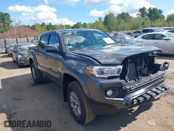 2017 Toyota Tacoma SR5 with VIN 3TMCZ5AN0HM102398, listed as a IAAI auction lot 43141321 with 136,440 mi miles and . Bid and sale history available at DreamBid. Image 14.
