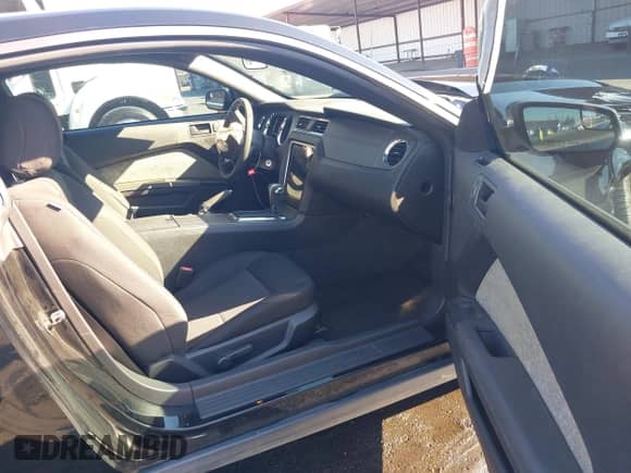 2012 Ford Mustang Premium with VIN 1ZVBP8AM4C5261141, listed as a IAAI auction lot 43217325 with 129,419 mi miles and . Bid and sale history available at DreamBid. Image 5.