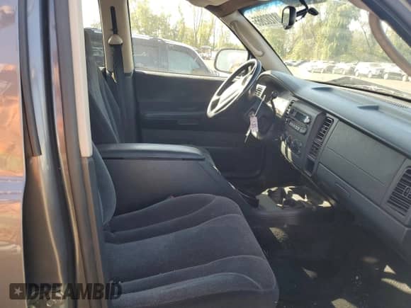 2003 Dodge Dakota SLT с VIN 1D7HG48N43S202683, выставлен на аукционе Copart как лот 81282665 с пробегом 167 450 миль миль и Списание • Salvage title. История ставок и продаж доступна на DreamBid. Изображение 7.