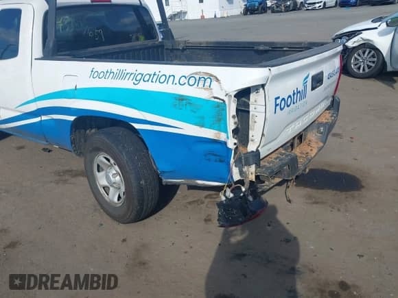 2020 Toyota Tacoma SR with VIN 5TFRX5GN8LX179711, listed as a IAAI auction lot 43384659 with 79,537 mi miles and . Bid and sale history available at DreamBid. Image 6.