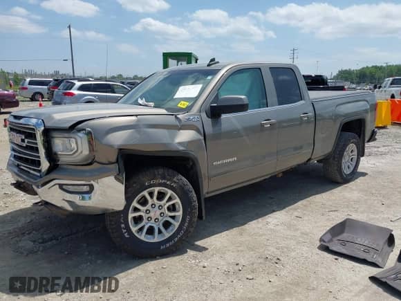 2017 GMC Sierra 1500 SLE with VIN 1GTV2MEC4HZ242534, listed as a IAAI auction lot 42534755 with 69,028 mi miles and . Bid and sale history available at DreamBid. Image 17.
