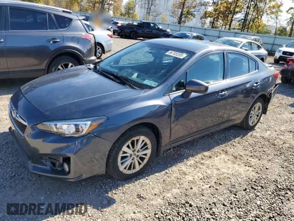 2017 Subaru Impreza Premium with VIN 4S3GKAD67H3618763, listed as a Copart auction lot 86705595 with 98,497 mi miles and Salvage title. Bid and sale history available at DreamBid. Image 1.