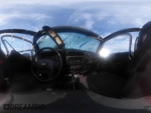 2004 Jeep Wrangler Sport z VIN 1J4FA49S34P802200, wystawiony jako IAAI lot #42706823 z przebiegiem Nie podano mil oraz . Historia ofert i sprzedaży dostępna na DreamBid. Obrazek 17.