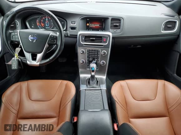 2015 Volvo S60 с VIN YV1902TL2F2368342, выставлен на аукционе Copart как лот 63053745 с пробегом 72 095 миль миль и Списание • Salvage title. История ставок и продаж доступна на DreamBid. Изображение 8.