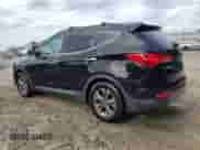 2016 Hyundai Santa Fe with VIN 5XYZU3LBXGG345566, listed as a Copart auction lot 55915735 with 142,742 mi miles and Salvage title. Bid and sale history available at DreamBid. Image 2.