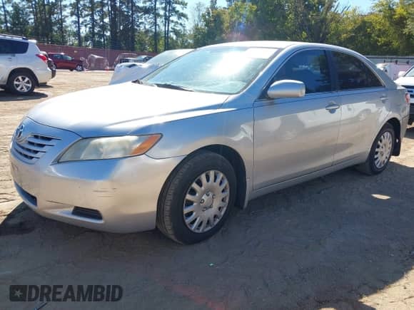 2007 Toyota Camry LE with VIN 4T1BE46K07U160596, listed as a IAAI auction lot 43525724 with 225,518 mi miles and . Bid and sale history available at DreamBid. Image 2.