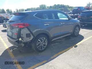 2021 Hyundai Tucson SEL with VIN KM8J33AL5MU312394, listed as a IAAI auction lot 43072281 with 46,296 mi miles and . Bid and sale history available at DreamBid. Image 4.