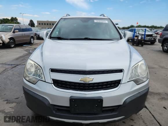 2013 Chevrolet Captiva Sport LS z VIN 3GNAL2EK4DS575807, wystawiony jako Copart lot #70582025 z przebiegiem 113 236 mil mil oraz Szkoda całkowita • Salvage title. Historia ofert i sprzedaży dostępna na DreamBid. Obrazek 5.