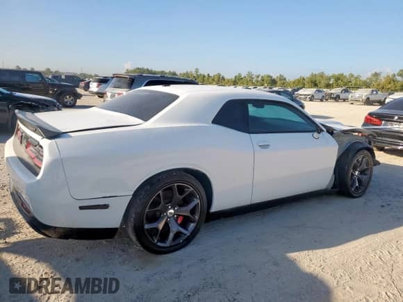 2012 Dodge Challenger SRT-8 392 с VIN 2C3CDYCJ7CH243958, выставлен на аукционе Copart как лот 85714725 с пробегом 77 933 миль миль и Списание • Salvage title. История ставок и продаж доступна на DreamBid. Изображение 3.