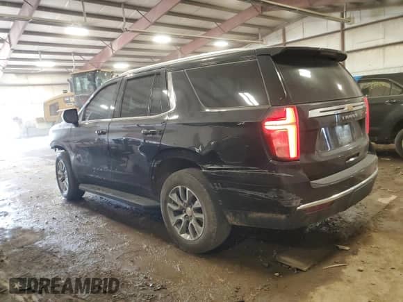 2021 Chevrolet Tahoe LS с VIN 1GNSKMKD2MR170900, выставлен на аукционе Copart как лот 54303785 с пробегом 76 777 миль миль и Списание • Salvage title. История ставок и продаж доступна на DreamBid. Изображение 2.