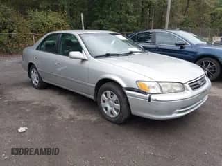 2001 Toyota Camry CE z VIN 4T1BG22K71U779806, wystawiony jako IAAI lot #43319787 z przebiegiem 92 919 mil mil oraz . Historia ofert i sprzedaży dostępna na DreamBid. Obrazek 1.