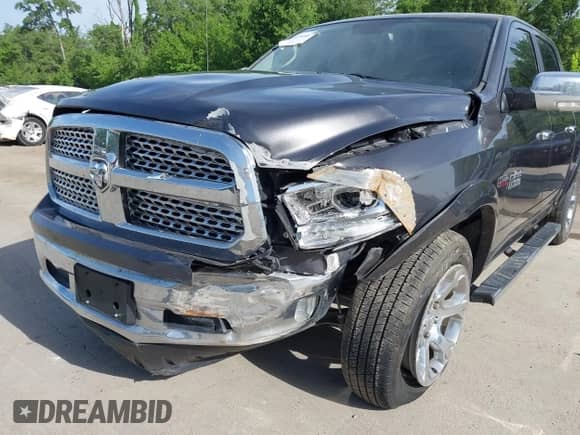 2017 Ram 1500 Laramie z VIN 1C6RR7NT4HS691372, wystawiony jako IAAI lot #42264467 z przebiegiem 135 395 mil mil oraz . Historia ofert i sprzedaży dostępna na DreamBid. Obrazek 6.