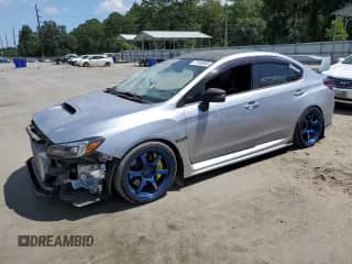 2018 Subaru WRX STI with VIN JF1VA2M61J9825979, listed as a Copart auction lot 71253805 with 97,623 mi miles and Salvage title. Bid and sale history available at DreamBid. Image 1.