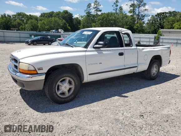1999 Dodge Dakota SLT z VIN 1B7GL22X2XS114639, wystawiony jako Copart lot #61749075 z przebiegiem 135 191 mil mil oraz Szkoda całkowita • Salvage title. Historia ofert i sprzedaży dostępna na DreamBid. Obrazek 1.