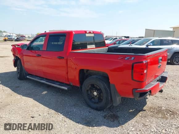 2018 Chevrolet Silverado 1500 LT with VIN 3GCUKREC6JG142529, listed as a IAAI auction lot 43126958 with 117,342 mi miles and . Bid and sale history available at DreamBid. Image 3.