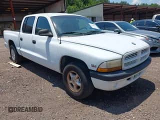 2000 Dodge Dakota Sport with VIN 1B7GL2AX1YS707993, listed as a IAAI auction lot 42670217 with 172,037 mi miles and . Bid and sale history available at DreamBid. Image 1.
