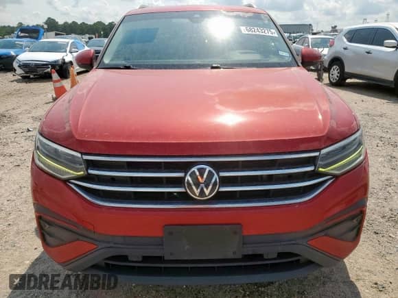 2023 Volkswagen Tiguan SE with VIN 3VVNB7AX8PM031560, listed as a Copart auction lot 68243275 with 60,620 mi miles and Salvage title. Bid and sale history available at DreamBid. Image 5.