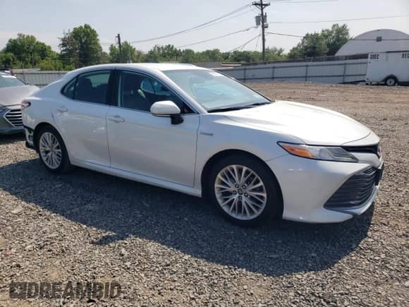 2019 Toyota Camry Hybrid LE с VIN 4T1B21HK5KU014272, выставлен на аукционе Copart как лот 62397815 с пробегом 59 834 миль миль и Списание • Salvage title. История ставок и продаж доступна на DreamBid. Изображение 4.