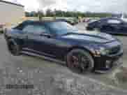 2013 Chevrolet Camaro ZL1 с VIN 2G1FZ3DPXD9801676, выставлен на аукционе Copart как лот 70084715 с пробегом 72 805 миль миль и Списание • Salvage title. История ставок и продаж доступна на DreamBid. Изображение 4.