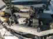 1995 Toyota Camry LE z VIN 4T1SK12E8SU548580, wystawiony jako Copart lot #64808935 z przebiegiem 166 718 mil mil oraz Szkoda całkowita • Salvage title. Historia ofert i sprzedaży dostępna na DreamBid. Obrazek 11.