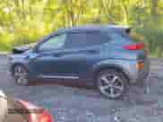 2019 Hyundai Kona Ultimate z VIN KM8K5CA5XKU329527, wystawiony jako IAAI lot #43159538 z przebiegiem 185 726 mil mil oraz . Historia ofert i sprzedaży dostępna na DreamBid. Obrazek 14.