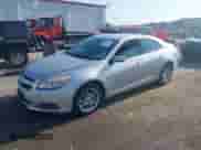 2013 Chevrolet Malibu Eco with VIN 1G11D5RR5DF110965, listed as a IAAI auction lot 43005571 with 72,295 mi miles and . Bid and sale history available at DreamBid. Image 2.