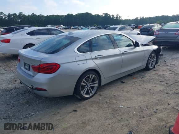 2019 BMW 4 Series 430i with VIN WBA4J1C58KBM14899, listed as a IAAI auction lot 43041756 with 81,650 mi miles and . Bid and sale history available at DreamBid. Image 4.